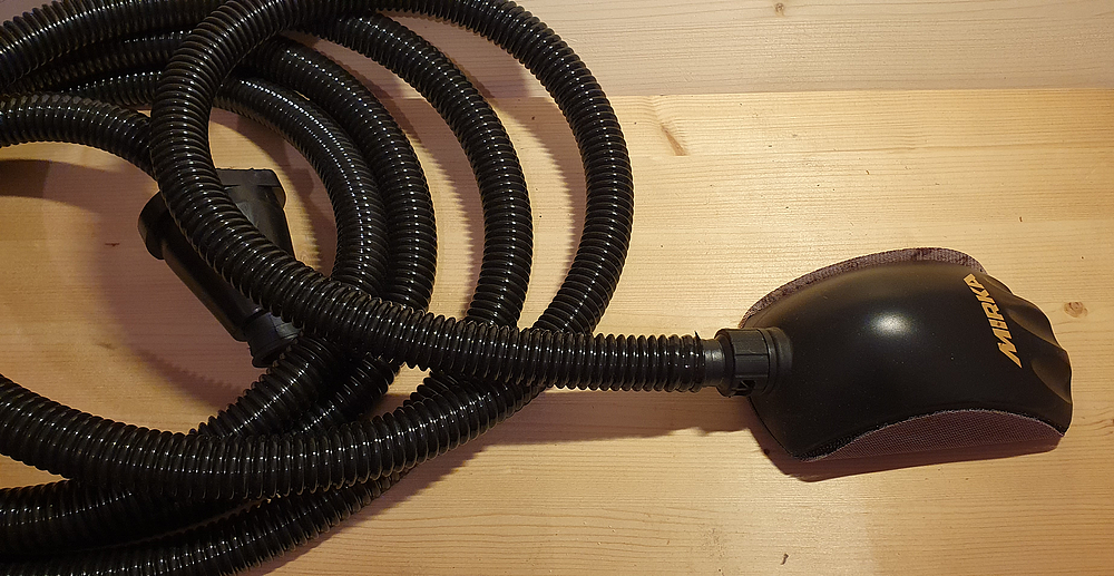 Hand sanding with suction